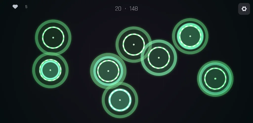 Green glowing rings scattered across a dark board.